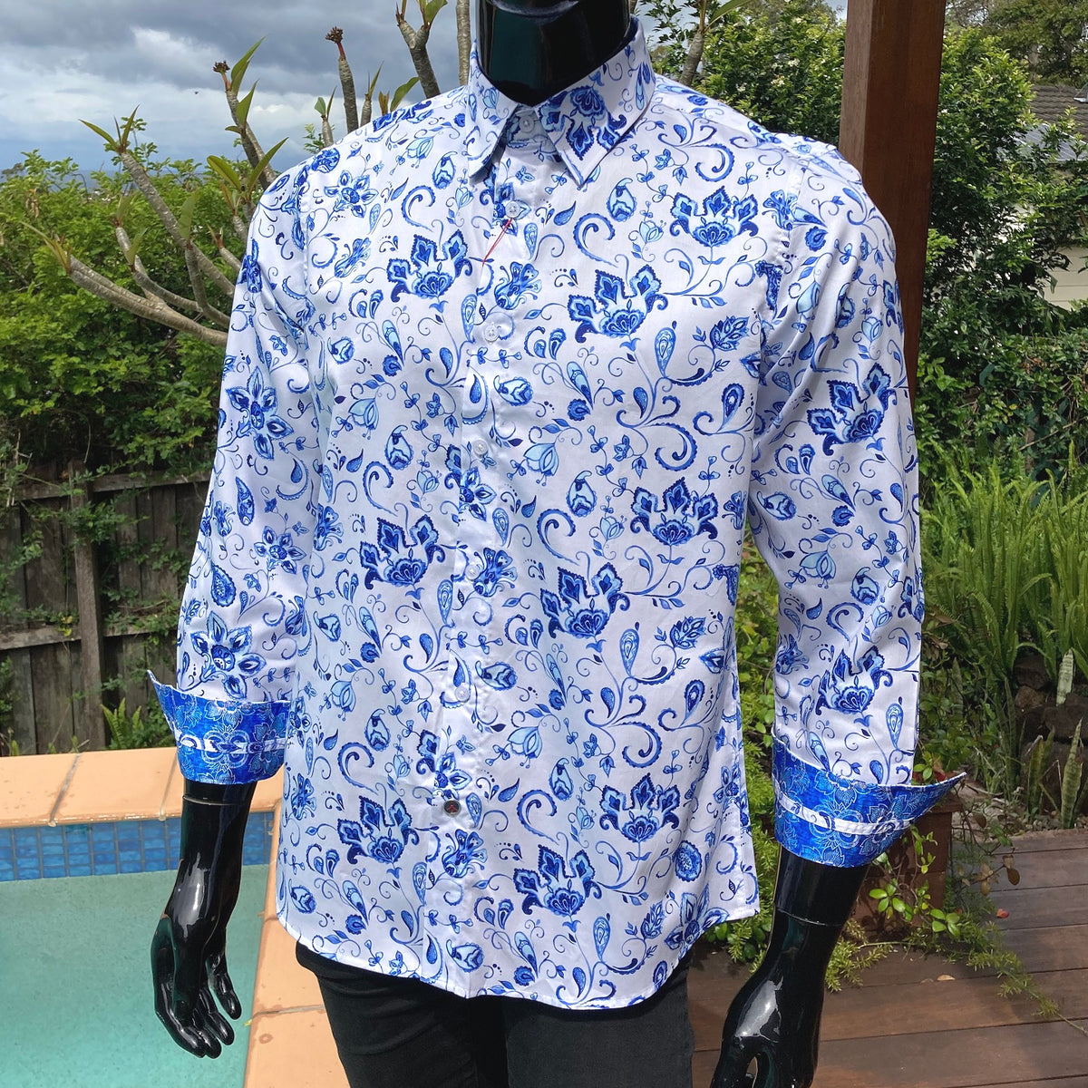 white and blue paisley shirt